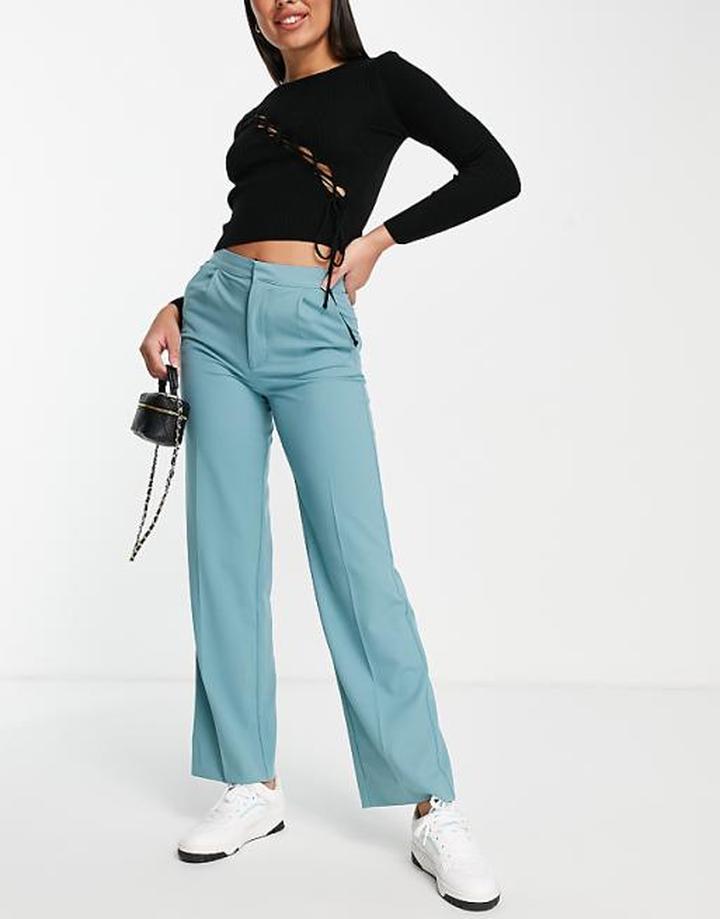 Stylowe zestawienia: co nosić z turkusowymi spodniami?