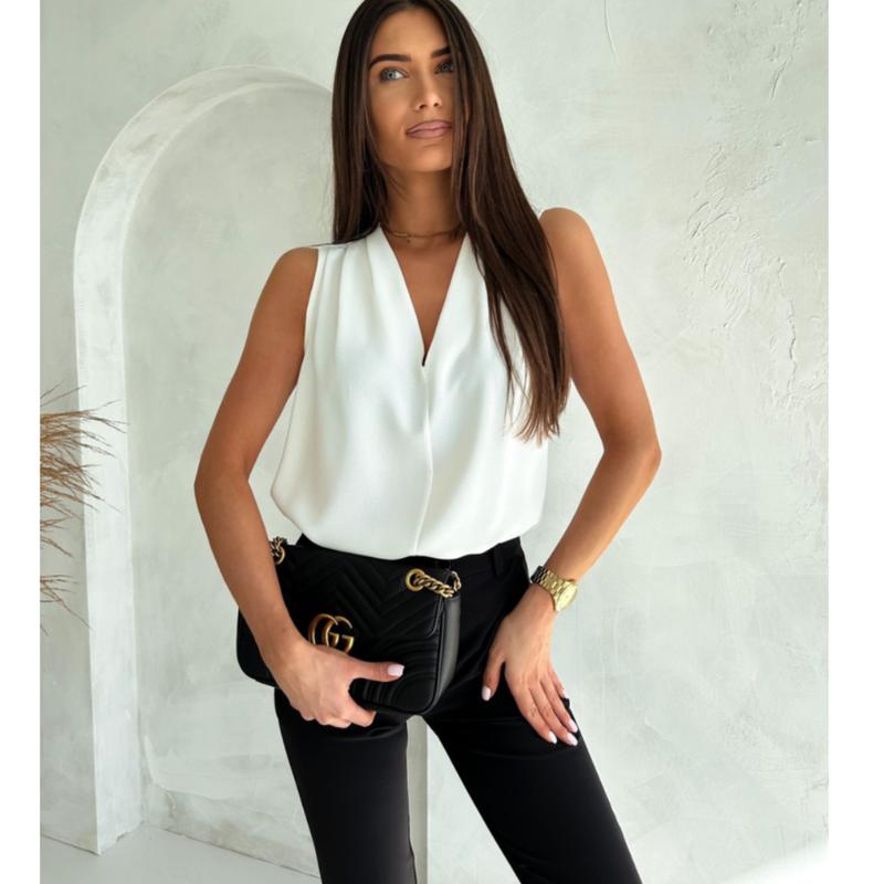 Idealne połączenie: jaką bluzkę do szarej marynarki wybrać?